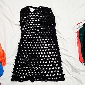 Black swim cover up laser cup holes. Size Small. Never worn brand new